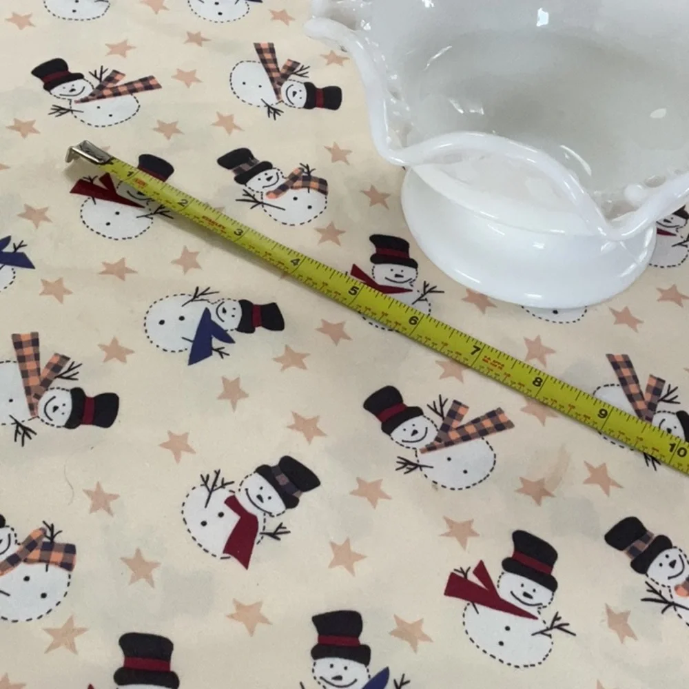 Three Christmas holiday tablecloths